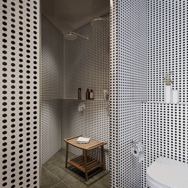 Black-and-white tiled shower and bathroom inside OmniView