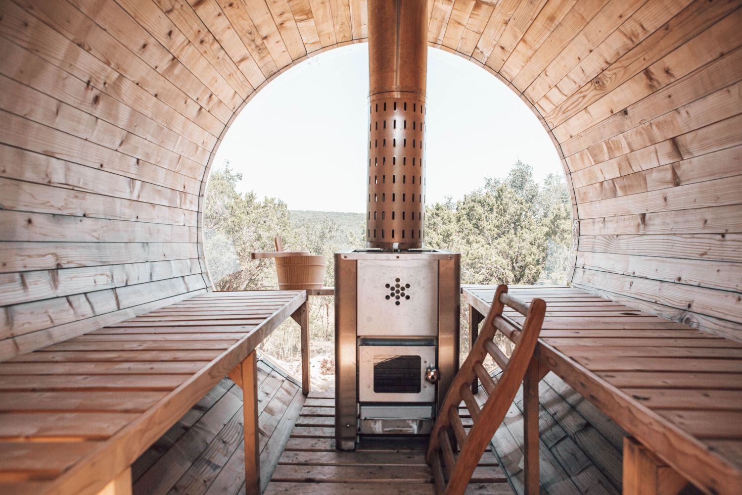 Inside OmniView's outdoor wood-burning barrel sauna